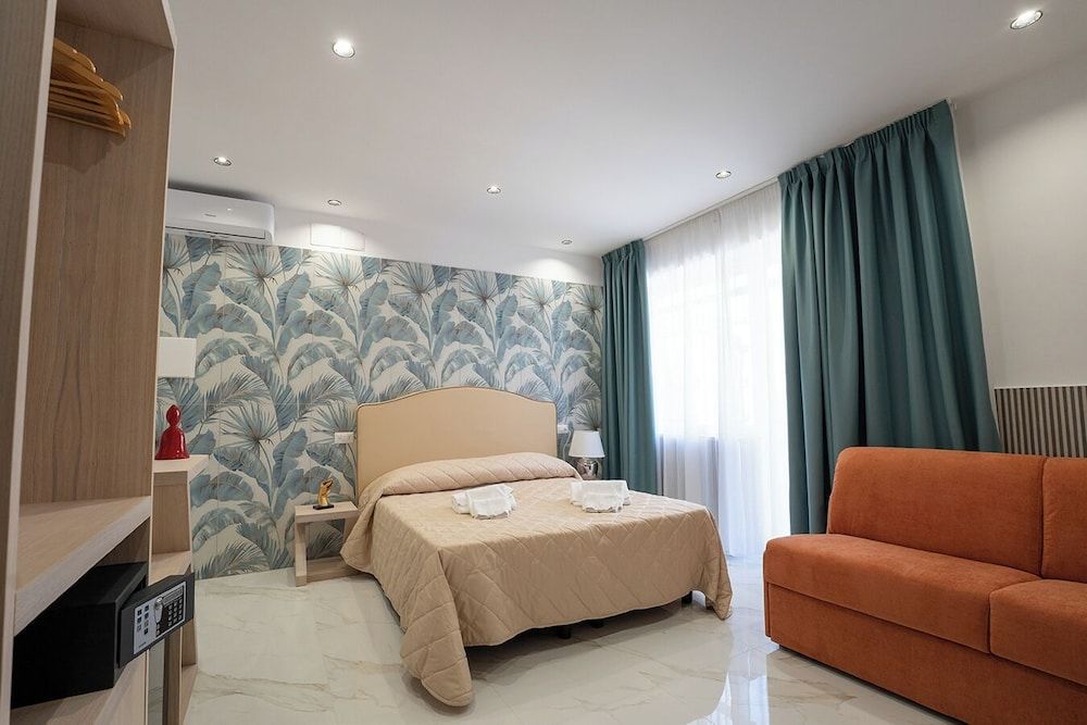 Deluxe Quadruple Room, Balcony, City View