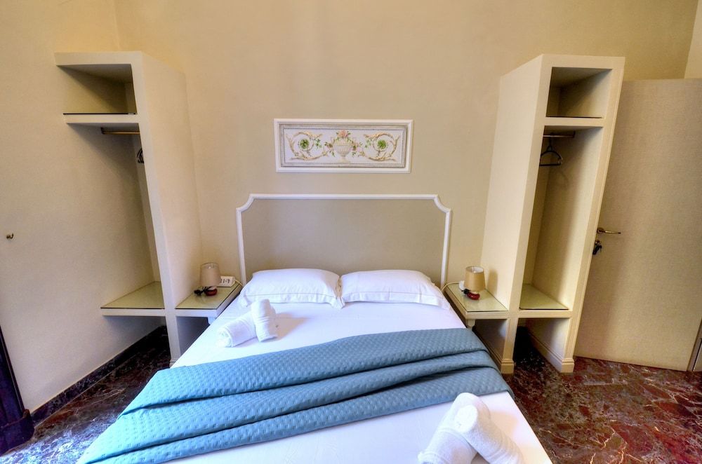 Palazzo Alibrandi Deluxe Double Room, City View 3