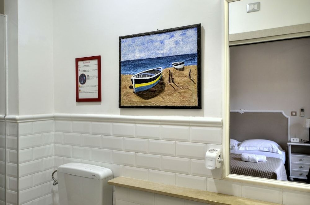 Palazzo Alibrandi Deluxe Double Room, City View 12