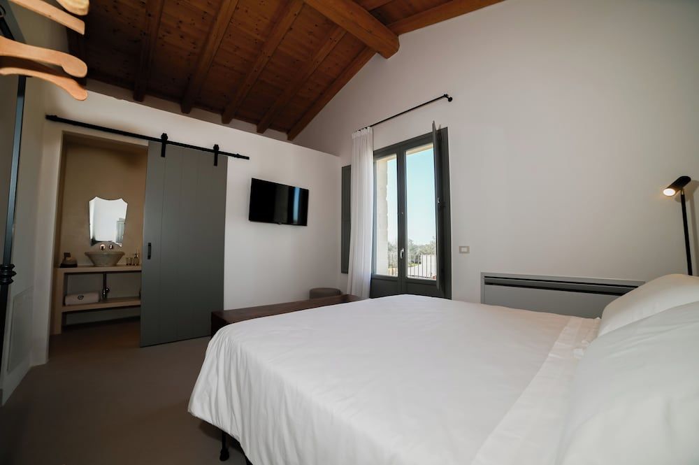 masseria casina fiocca Deluxe Quadruple Room, Balcony, Garden View 3