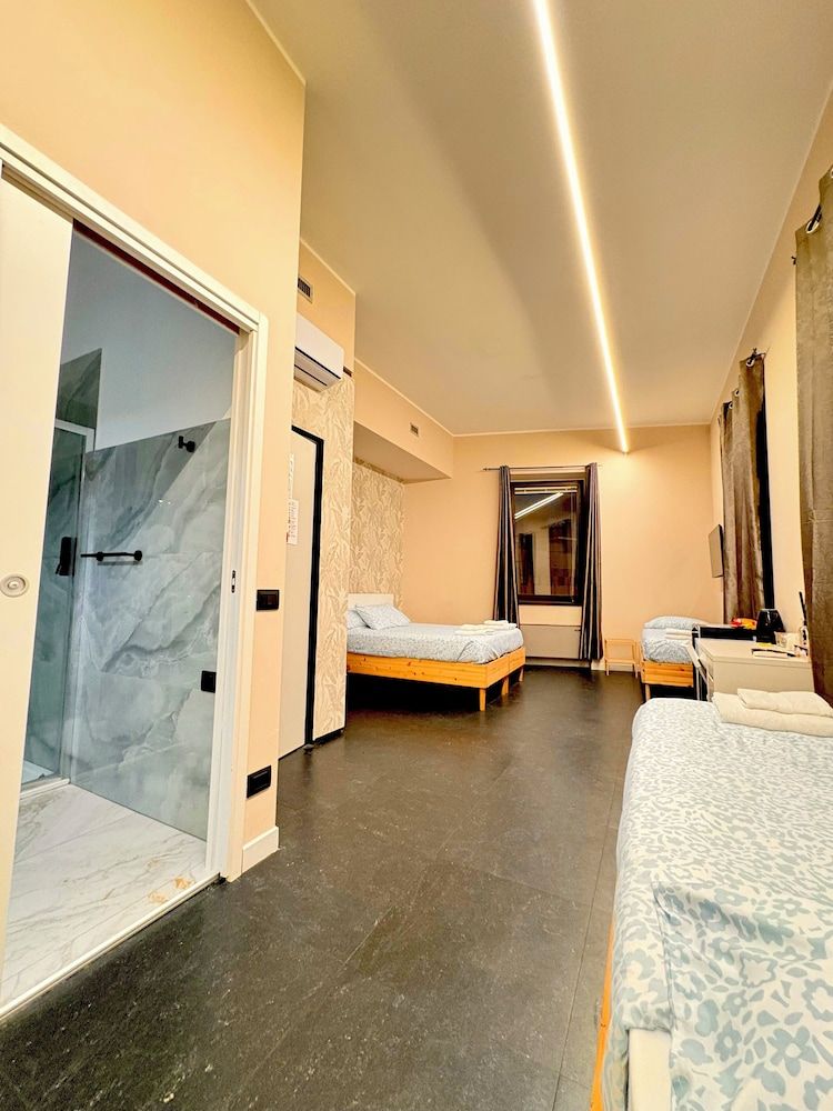 Comfort Quadruple Room, City View