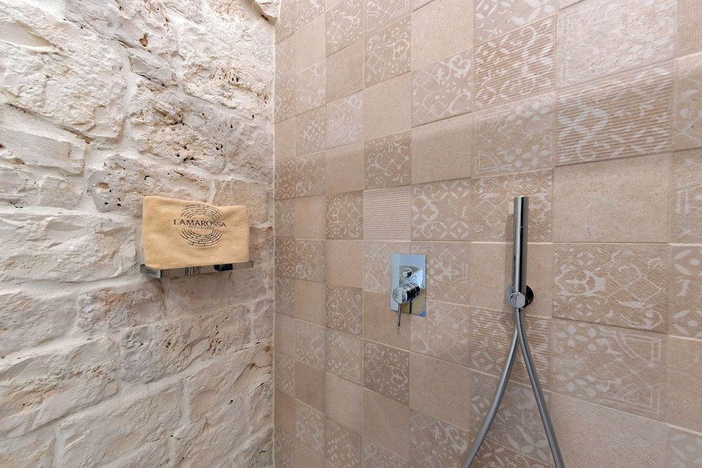 Lamarossa Trulli & Suites Family Room, Patio, Garden View 10