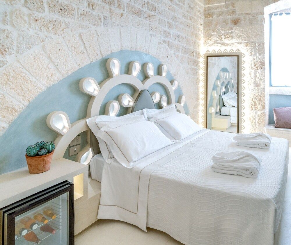 Vico Bianco Raro Rooms Collections