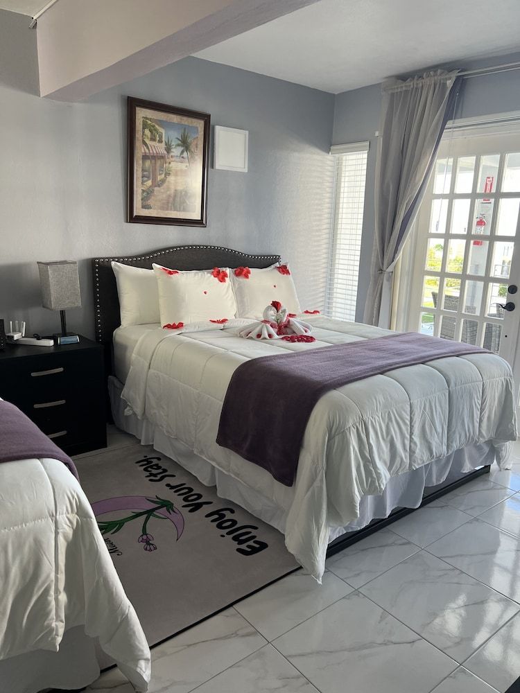 Lavender Moon Villas Deluxe Room, 2 Queen Beds, Air conditioning, Sea View