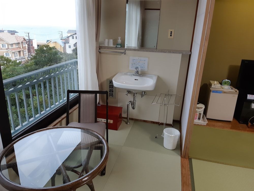 Check-in by 9pm Quadruple Room, Non Smoking, Partial Ocean View