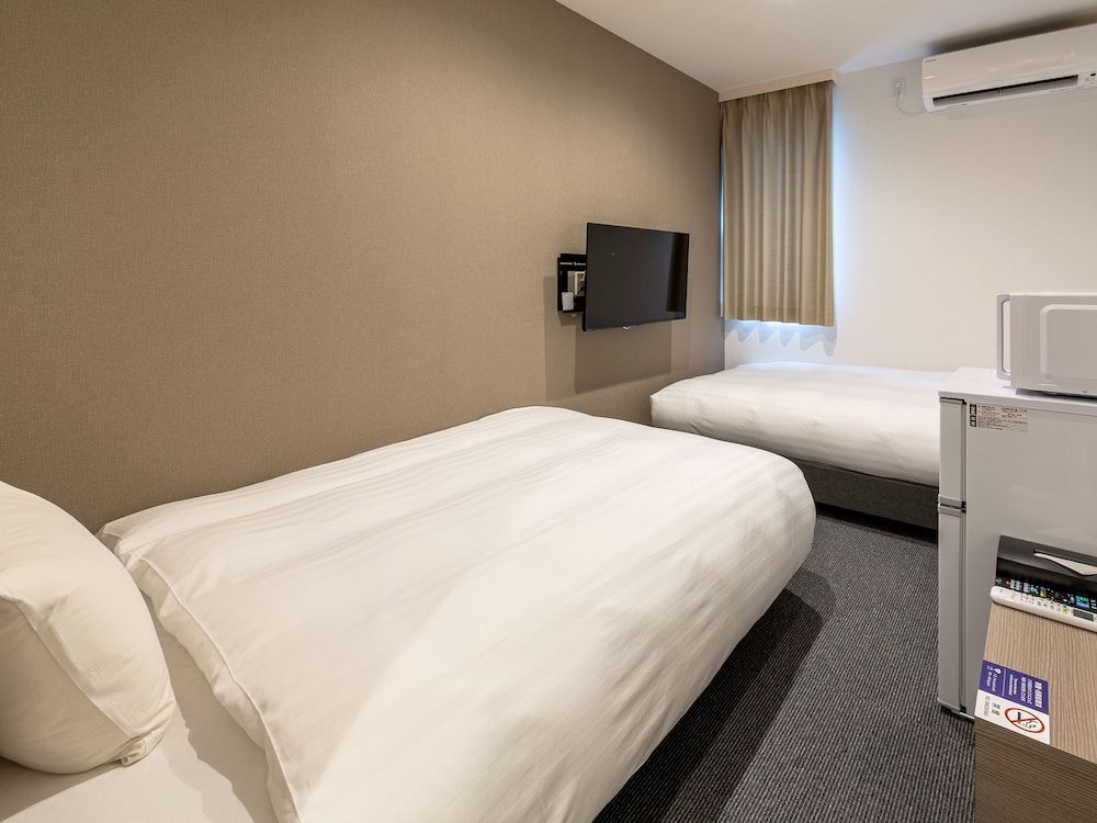 Standard Twin Room (check-in is not available after 11PM)