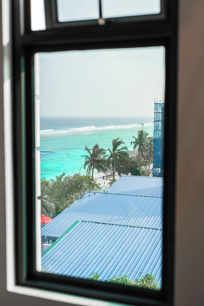 Aina Residency Beachfront Hotel Deluxe Apartment, City View 6