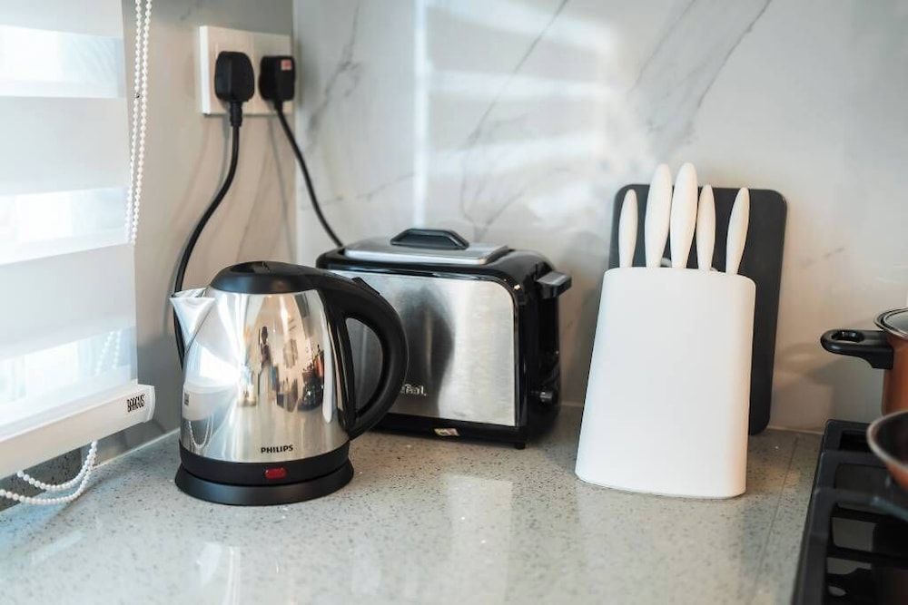 Aina Residency Beachfront Hotel Deluxe Apartment, City View 12