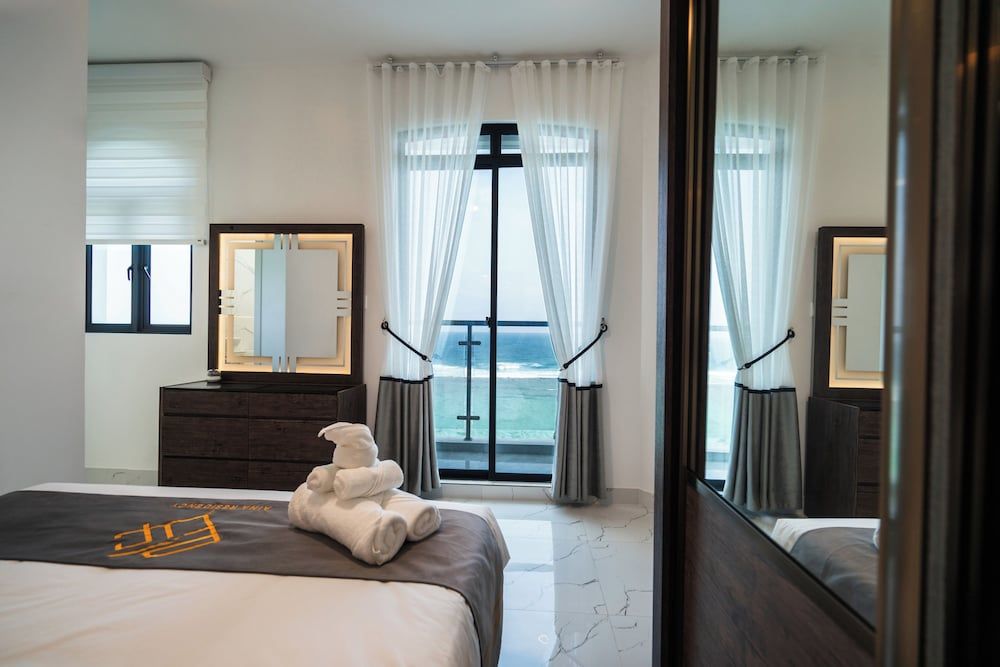 Aina Residency Beachfront Hotel