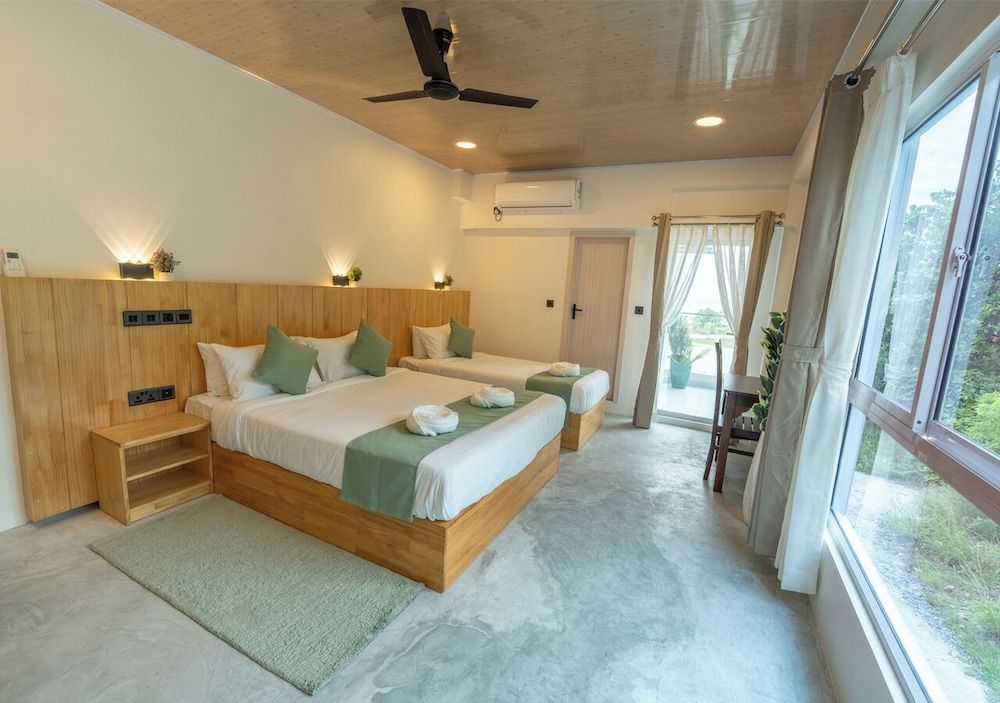 Blissview Maldives Deluxe Triple Room, Sea View 7