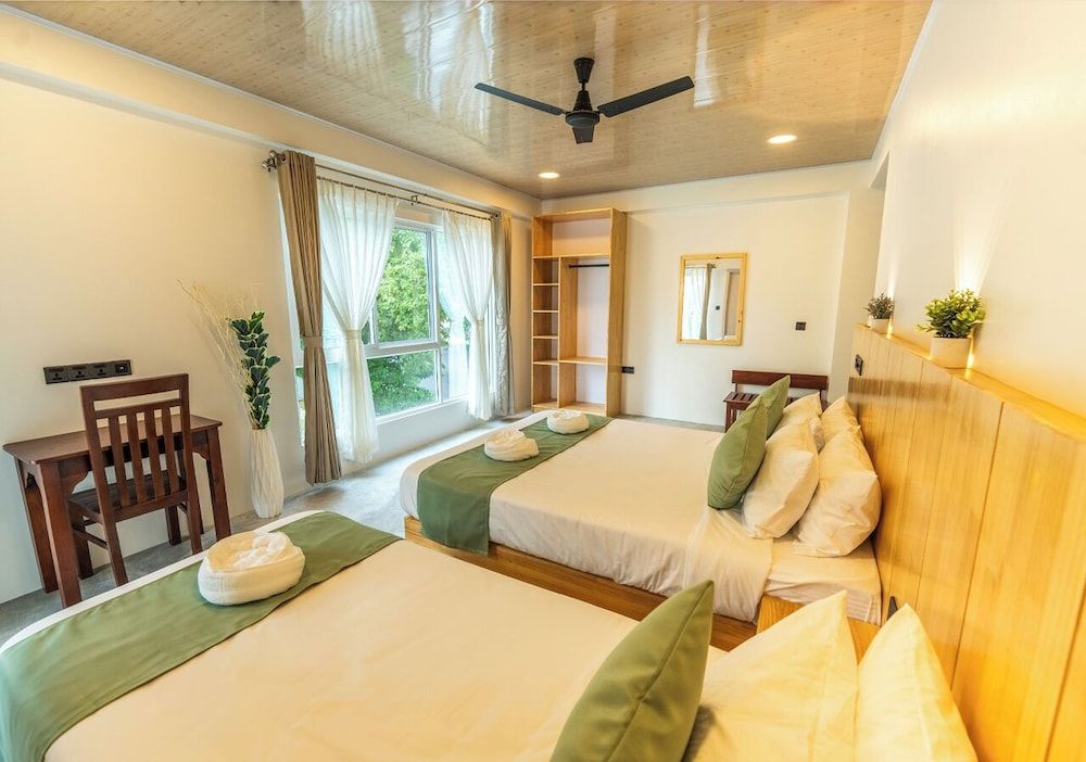 Blissview Maldives Deluxe Triple Room, Sea View 5