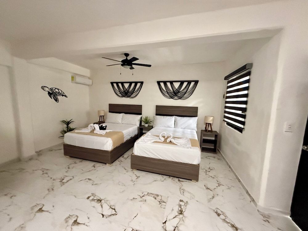 CASA TORTUGA 5Th. Ave Family Suite, Multiple Beds, Garden View 7