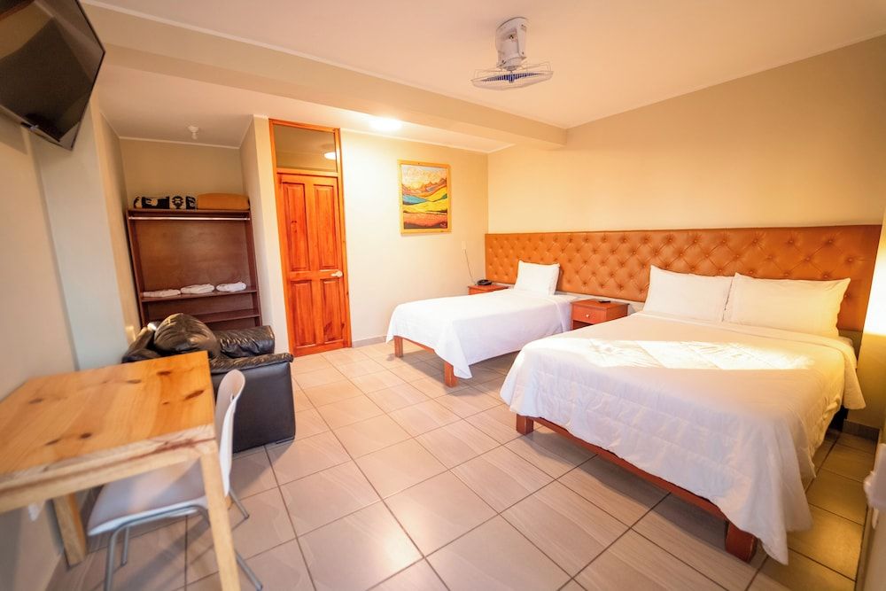 Family Triple Room, Multiple Beds, Private Bathroom, Garden View