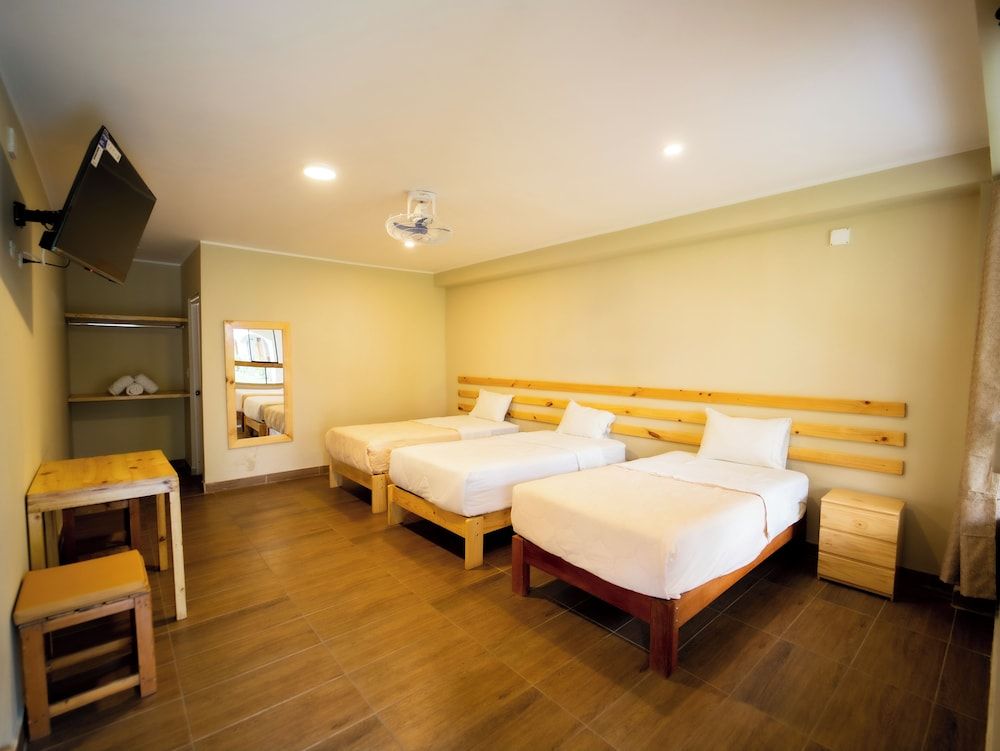 Standard Triple Room, Balcony, Garden View