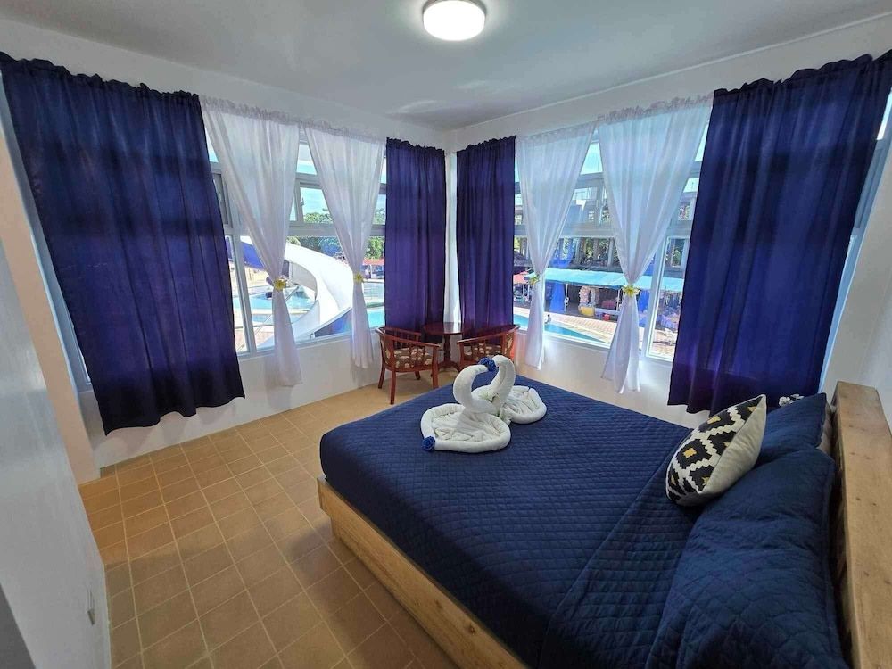 The Blessed Purple Bamboo Beach Resort Honeymoon Condo, 1 Queen Bed, Non Smoking, Pool View