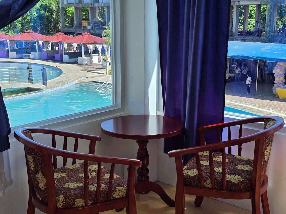 The Blessed Purple Bamboo Beach Resort Honeymoon Condo, 1 Queen Bed, Non Smoking, Pool View 2