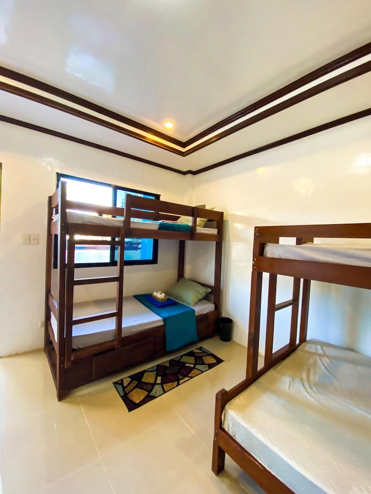 Hapitanan Siargao Comfort Shared Dormitory, Balcony, Garden View 11