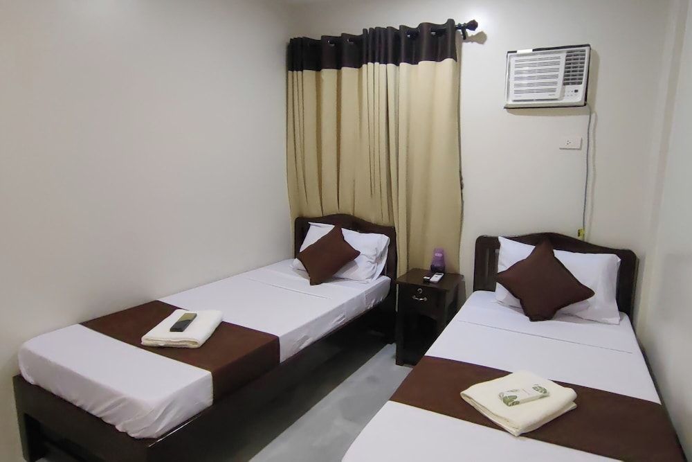 Jmorino Pension House Palawan City Center