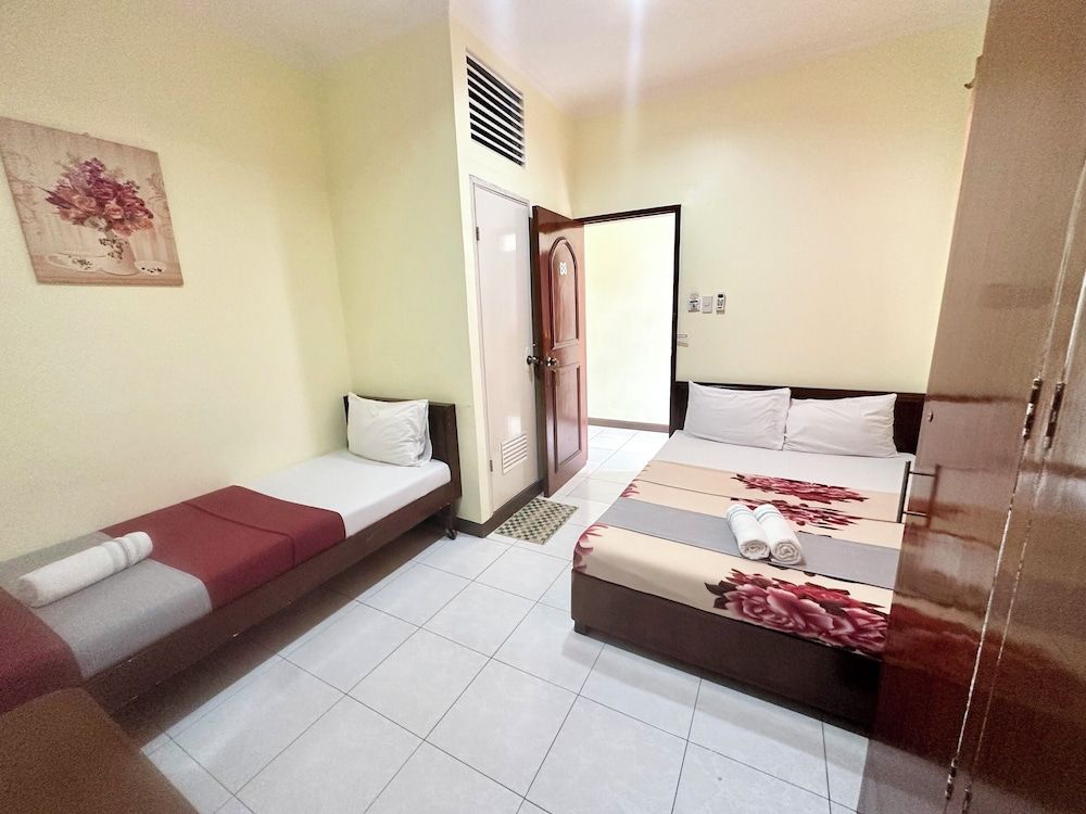 Davao Hub Dormitel Bed & Breakfast Family Room, Multiple Beds 7