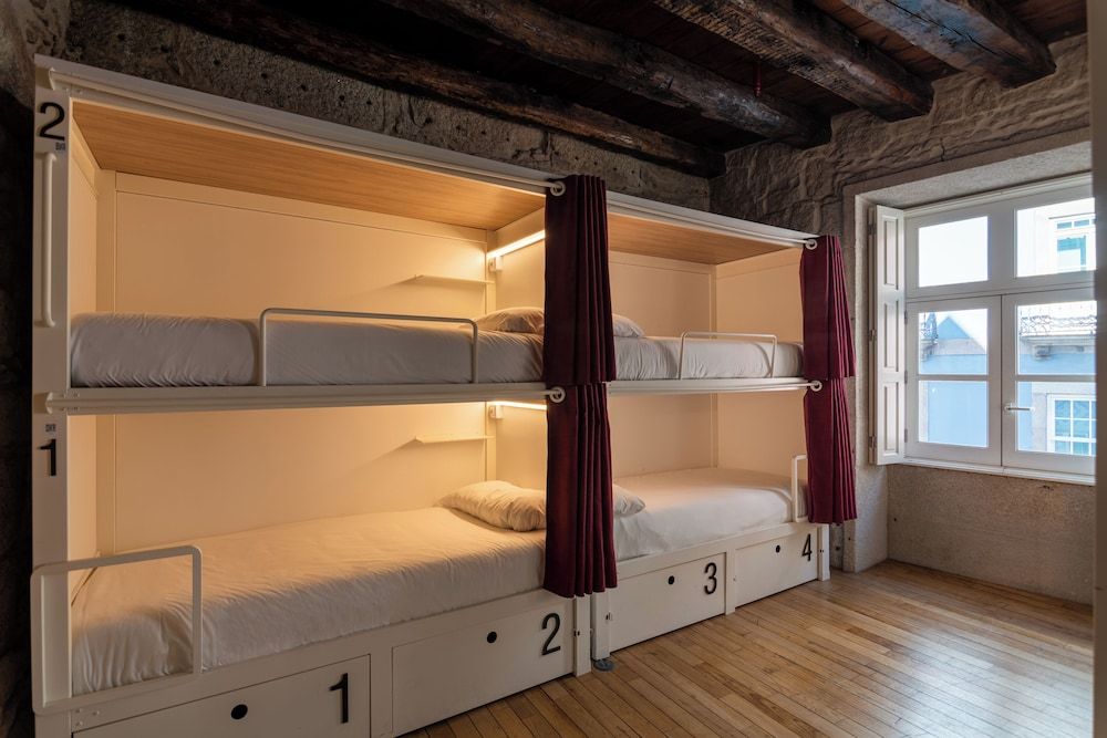 Bed in shared 12-mixed dorm with private bathroom