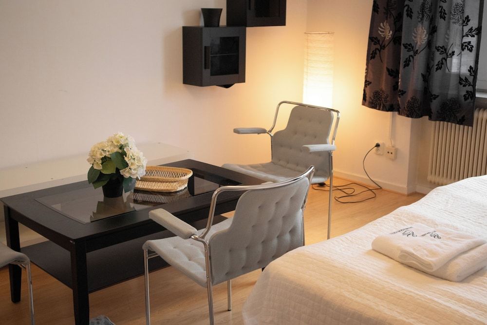 Säffle Suites - By Svaneholm Hotel Family Apartment, Garden View 12