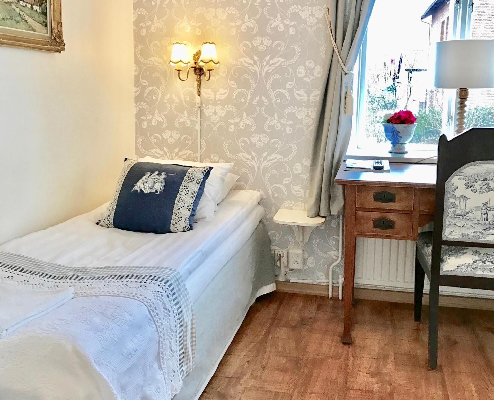 Single Room with Shared Shower and Toilet