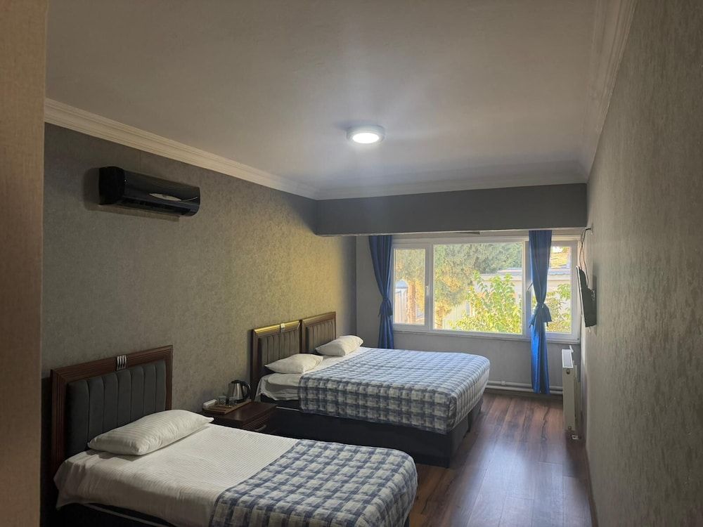 Basic Quadruple Room, Multiple Beds, Pool View