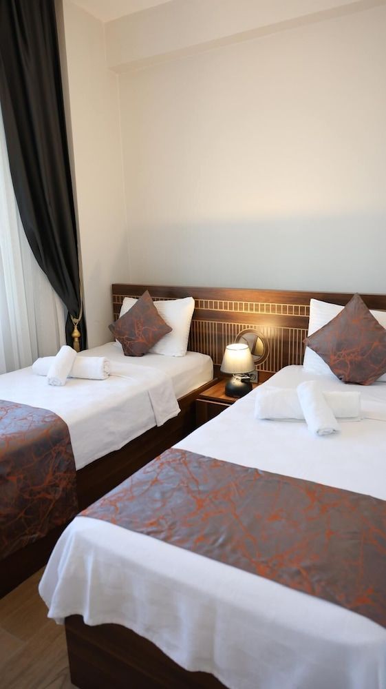Başaran Rezidans & Otel Family Triple Room, Multiple Beds, Smoking, Balcony 6