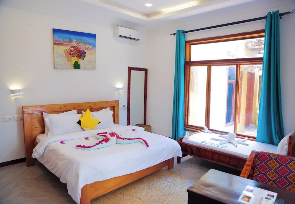 Palm Cultural Village Deluxe Room 3