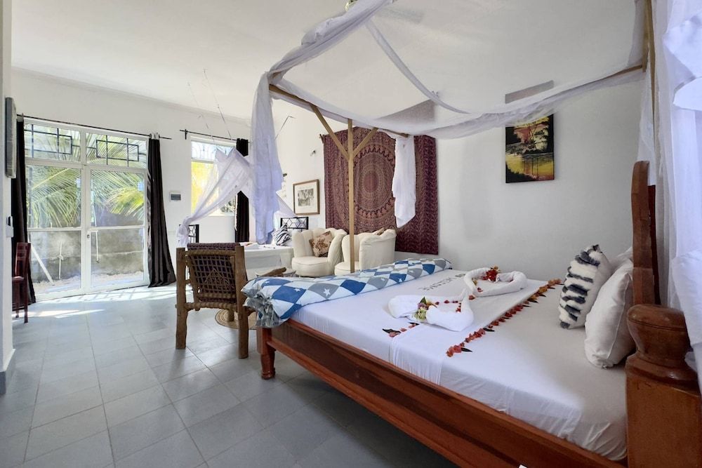 Zanzibar Lodge Deluxe Triple Room 5