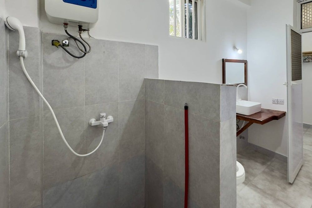 Zanzibar Lodge Deluxe Double Room, Balcony, Pool View 4