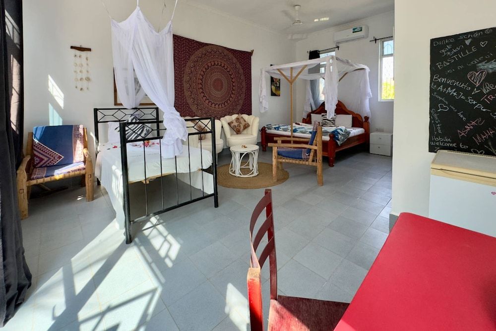 Zanzibar Lodge Deluxe Triple Room 4