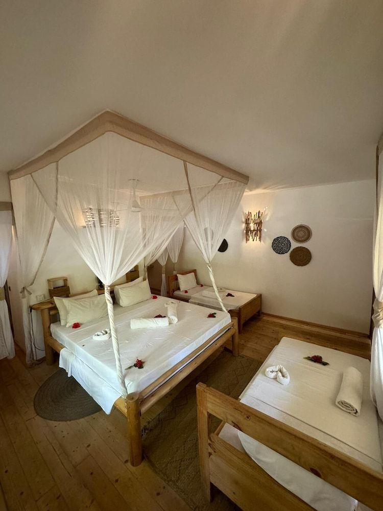 Tsunami village Deluxe Quadruple Room 2