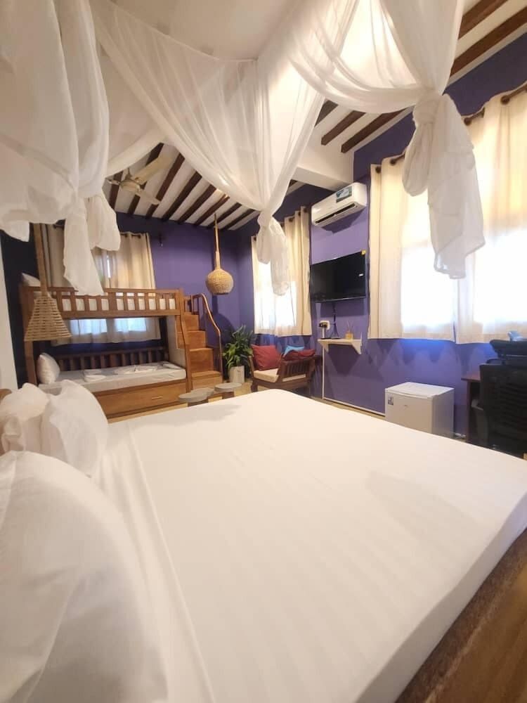 Sand and Sunset JGM Hotel Paje Deluxe Triple Room 6