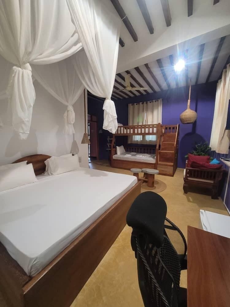 Sand and Sunset JGM Hotel Paje Deluxe Triple Room 2