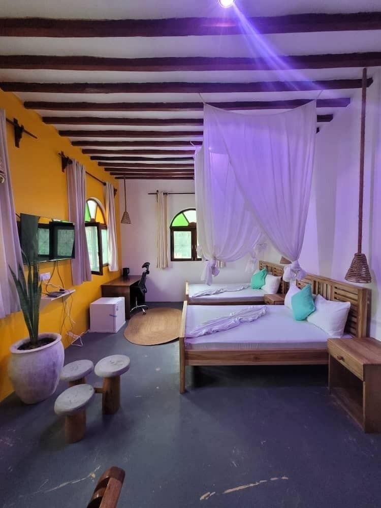 Sand and Sunset JGM Hotel Paje Deluxe Twin Room, Pool View 4