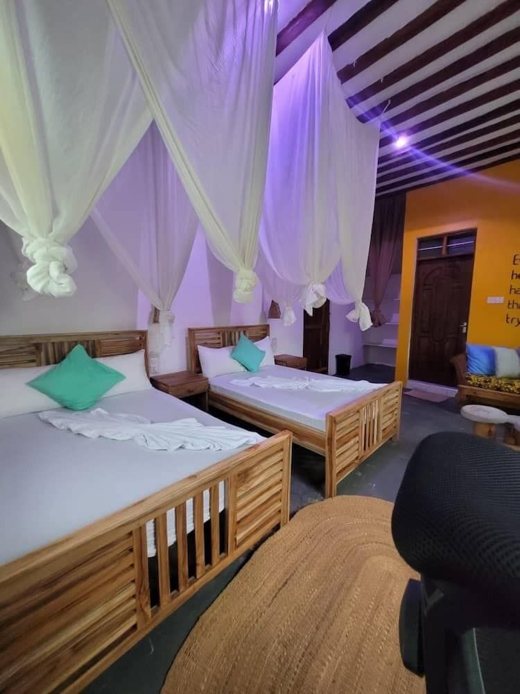 Sand and Sunset JGM Hotel Paje Deluxe Twin Room, Pool View 3