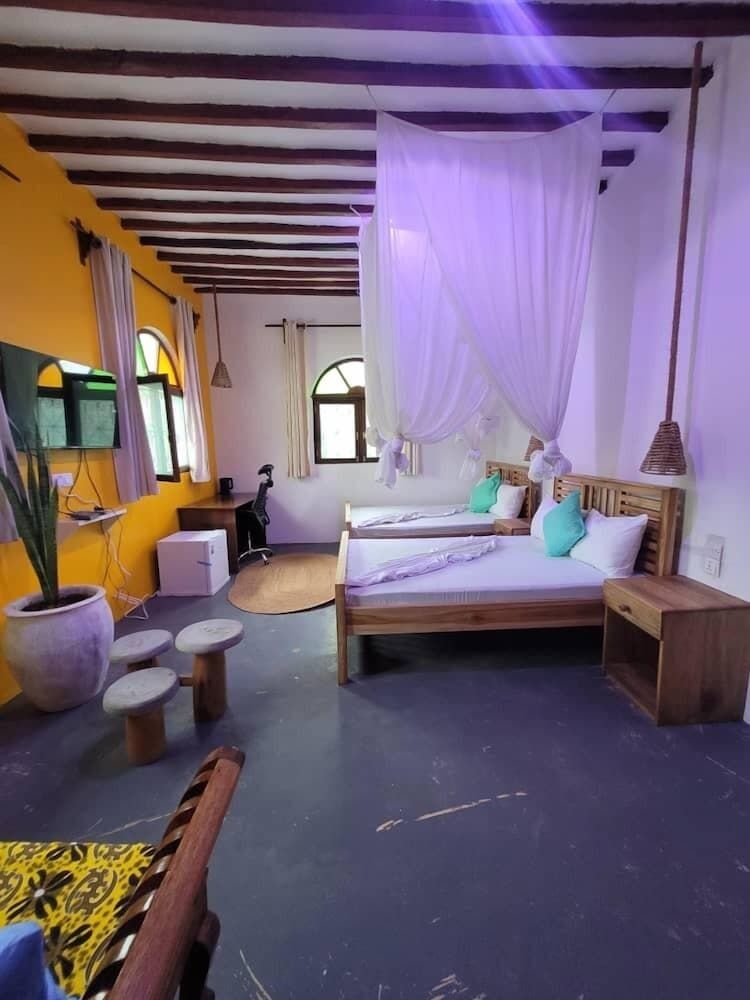 Sand and Sunset JGM Hotel Paje Deluxe Twin Room, Pool View 5