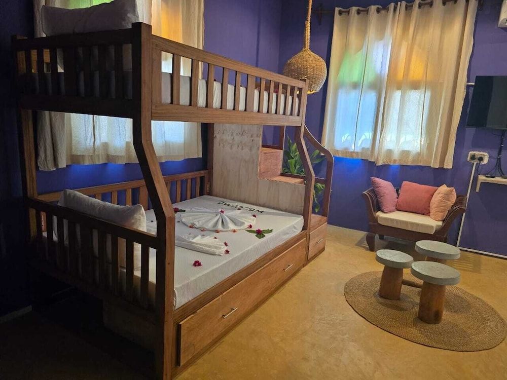 Sand and Sunset JGM Hotel Paje Deluxe Triple Room 5