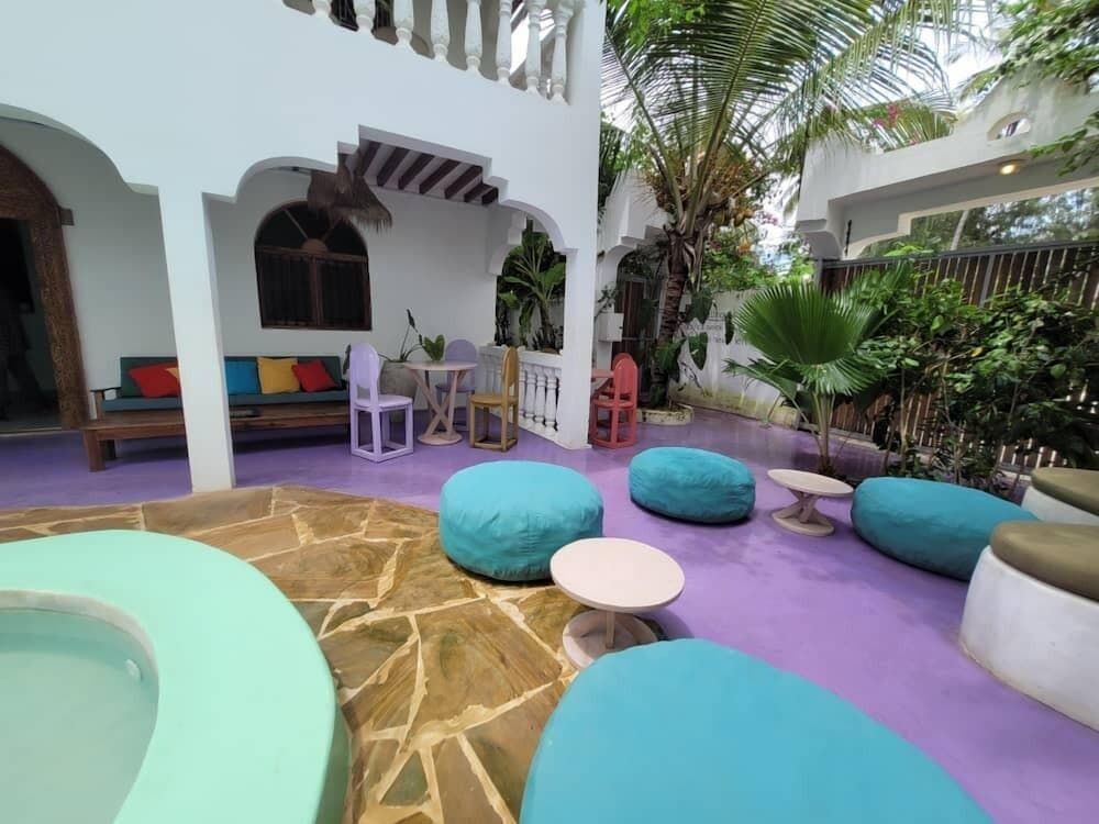 Sand and Sunset JGM Hotel Paje Deluxe Twin Room, Pool View 15