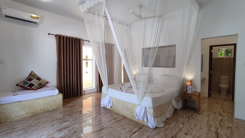 Deluxe Triple Room, Garden View