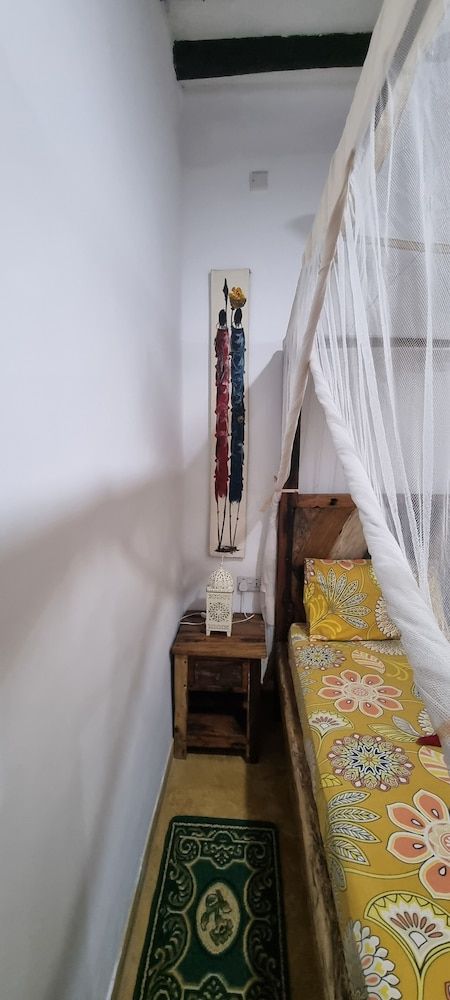 Salama & Mbuyuni Bungalows Superior Quadruple Room 12