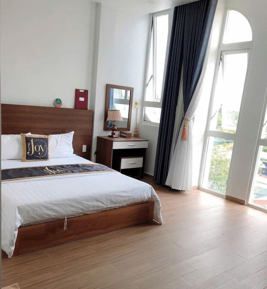 Joy Hotel Deluxe Double Room Single Use, Balcony, City View 3