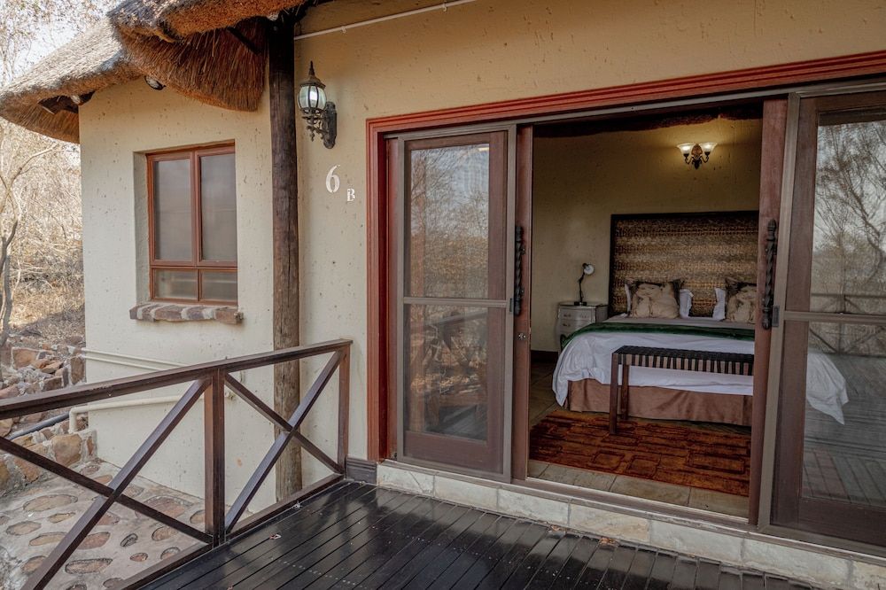 Room in Guest Room - Mmakuba Private Game Lodge, Deluxe Chalet 8B Room, 1 Bedroom, Patio, Garden View 2