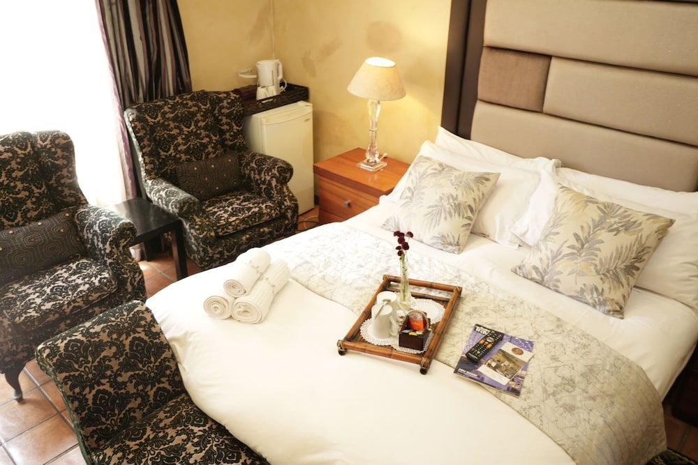 Tuscan Lodge Polokwane Deluxe Suite, Patio, Garden View 6