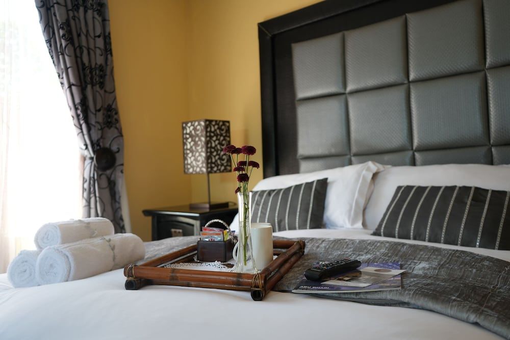 Tuscan Lodge Polokwane Deluxe Suite, Patio, Garden View 3