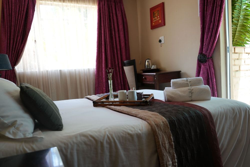 Tuscan Lodge Polokwane Standard Single Room, Garden View 4