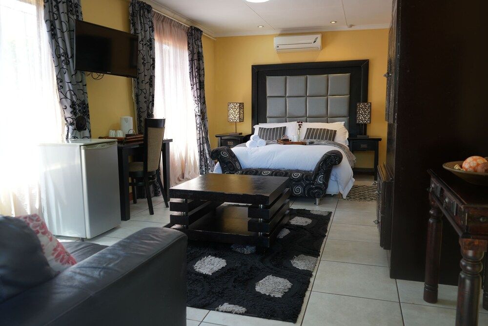 Tuscan Lodge Polokwane Deluxe Suite, Patio, Garden View 9