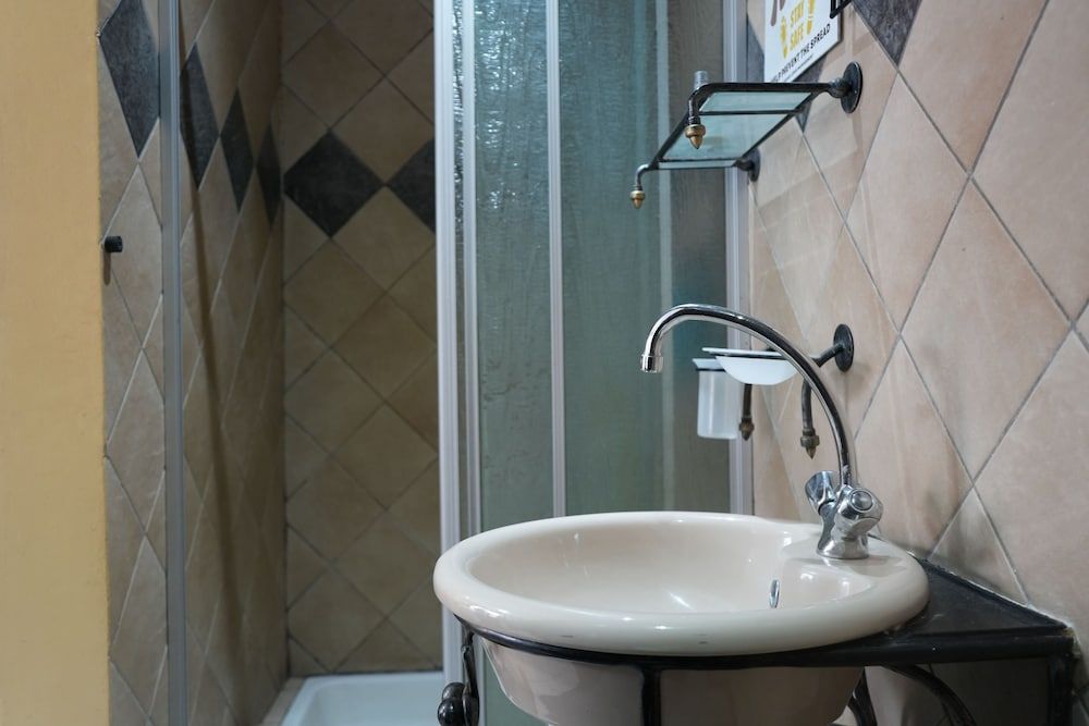 Tuscan Lodge Polokwane Deluxe Suite, Patio, Garden View 10