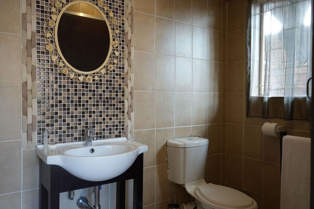 Tuscan Lodge Polokwane Standard Single Room, Garden View 14